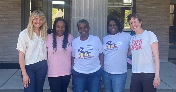 Members of the Philly Joy Bank evaluation team gather for a photo at event at Smith Playground